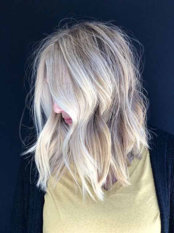 Wavy Shoulder-Length Hair in Polar Blonde