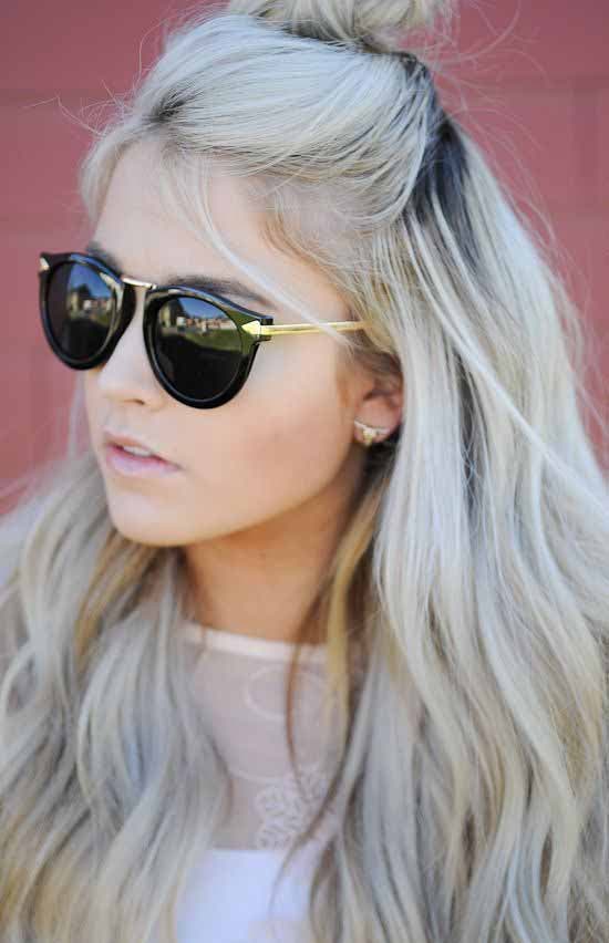 Long hair in polar blonde and top knot