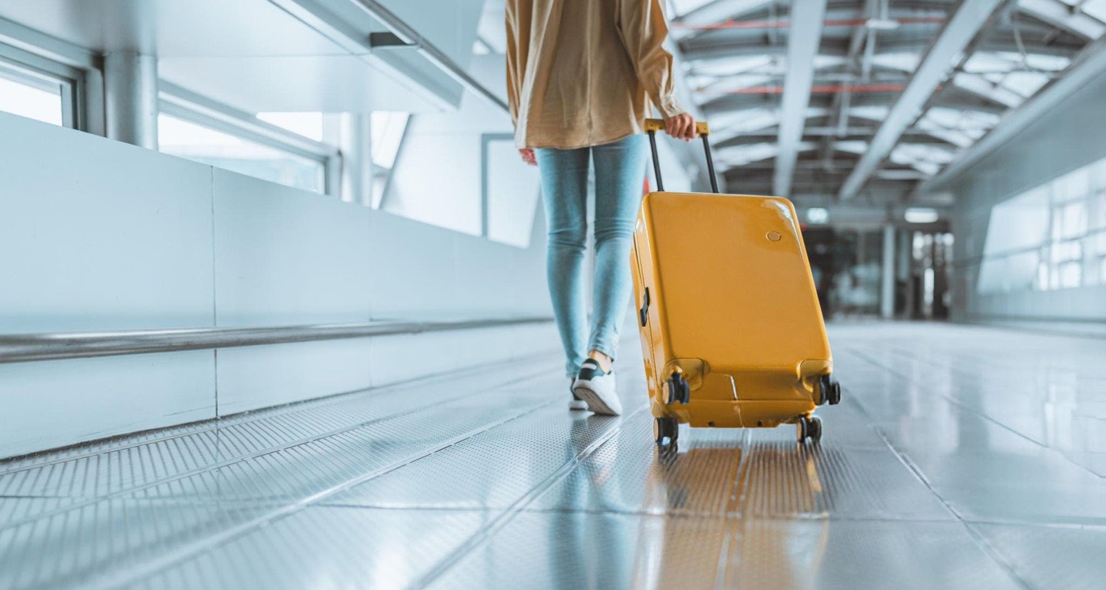 Carrying a suitcase to the airport